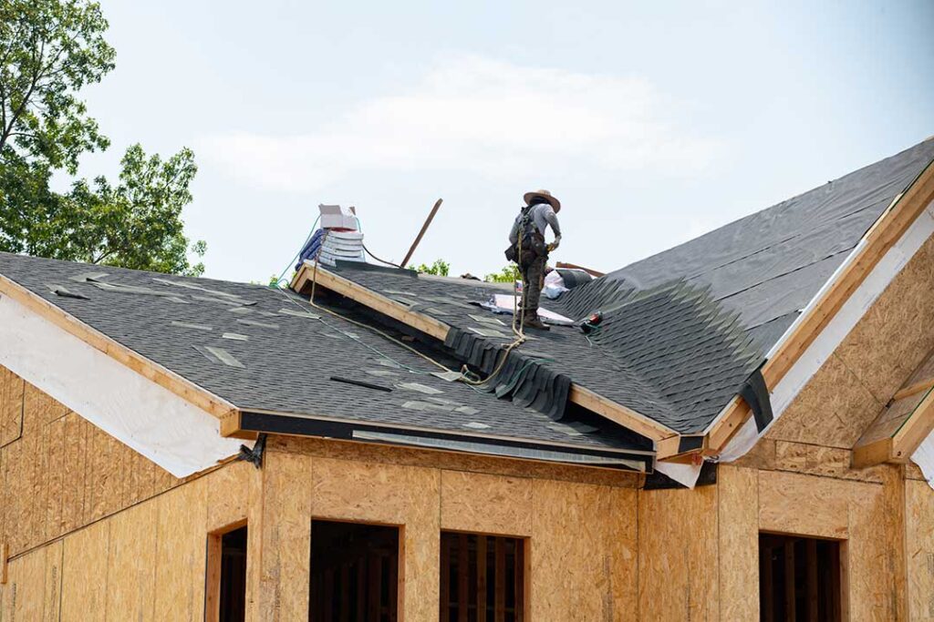 Roofing samples beside a rating chart showing solar reflectance, thermal emittance, and SRI values.