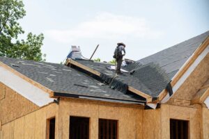 Roofing samples beside a rating chart showing solar reflectance, thermal emittance, and SRI values.
